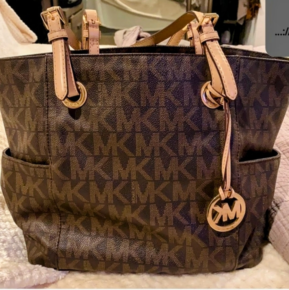 Micheal Kors East West Jet Set MK Monogram Bag.